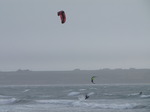 SX02952 Kitesurfers jumping from wave at Tramore beach.jpg